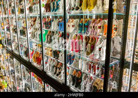 Florence Italy inside Gucci Garden Luxury Shop Display Sneakers store Collection Display Abstract gucci WOP modernist graphic Stock Photo Alamy