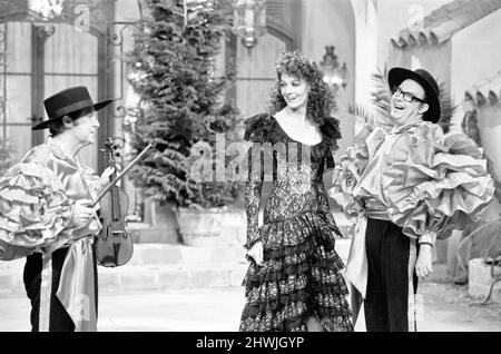 Rehearsing Morecambe & Wise Christmas Show, 18th December 1973. Eric Morecambe and Ernie Wise, pictured with: Vanessa Redgrave in a scene from the Mambo Dance. Vanessa Redgrave playing Josephine with Eric as the Duke of Wellington & Ernie as Napoleon. Stock Photo