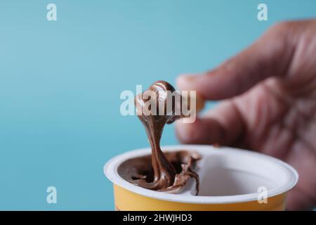 breadstick with chocolate spread in container  Stock Photo