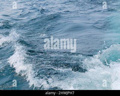 Surface view of blue Lake Michigan water with a small wave Stock Photo