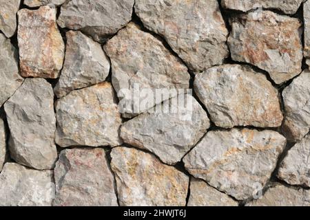 large granite wall light gray and light brown Stock Photo
