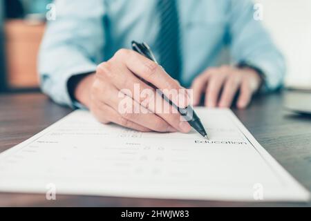 HR staff Submit a job application for new employees to fill out job application documents. job vacancy, job application concept. Stock Photo