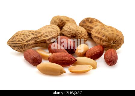 Peanuts on a white background. Peanut isolate, in shell and shelled Stock Photo