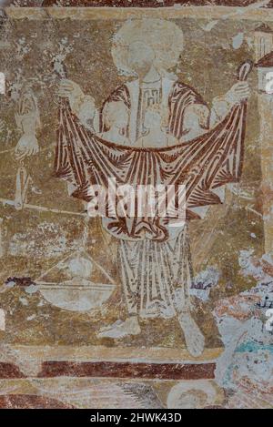 Fresco from the 1300s depicting Abraham holding the saved souls in a cloth and the archangel Michael weighs them in a scale, Orslev church, Denmark, A Stock Photo