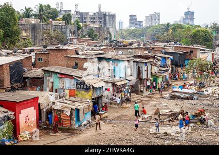 Mumbai India,Dharavi Shahu Nagar,slum shanties poor poverty lower Hindu caste,residents low income trash litter urban ghetto homes Stock Photo