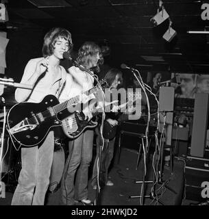 SMALL FACES UK pop group in 1976 from left Steve Marriott, Ian McLagan ...