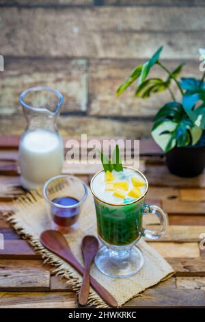 Indonesia traditional iced dessert call Es Cendol : made from rice flour, palm sugar, coconut milk, and pandanus leaf and very popular during fasting Stock Photo