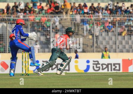 Dhaka, Bangladesh. 05th Mar, 2022. Bangladesh cricket player Mahmudullah (R) in action during the second T20 match between Afghanistan cricket team and Bangladesh at Sher-E-Bangla National Cricket Stadium. Afghanistan won by 8 wickets (with 14 balls remaining) Credit: SOPA Images Limited/Alamy Live News Stock Photo