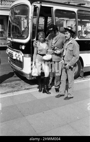 The 'Carry On' film team are making a new epic down at Brighton - called 'Carry On at Your Convenience'. The occasion for the trip to Brighton is the annual outing of the staff of a toilet ware factory. Margaret Nolan is pictured with Bernard Bresslaw and Kenneth Cope. 3rd May 1971. Stock Photo