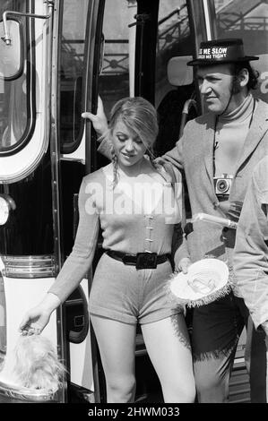 The 'Carry On' film team are making a new epic down at Brighton - called 'Carry On at Your Convenience'. The occasion for the trip to Brighton is the annual outing of the staff of a toilet ware factory. Margaret Nolan is pictured with Bernard Bresslaw. 3rd May 1971. Stock Photo