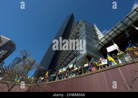 Supporters gather at Seattle City Hall for a rally and march against the Russian invasion of Ukraine in Seattle on Saturday, March 5, 2022. Hundreds a Stock Photo