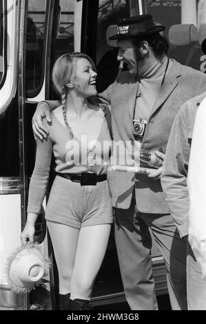 The 'Carry On' film team are making a new epic down at Brighton - called 'Carry On at Your Convenience'. The occasion for the trip to Brighton is the annual outing of the staff of a toilet ware factory. Margaret Nolan is pictured with Bernard Bresslaw. 3rd May 1971. Stock Photo