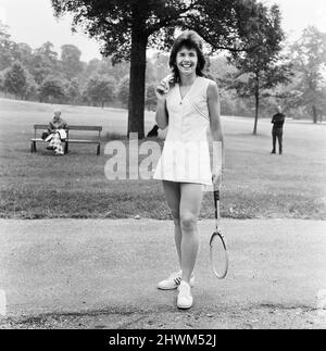 Billie Jean King (Moffitt) born November 22, 1943) is an American former World No. 1 professional tennis player. King won 39 Grand Slam titles: 12 in singles, 16 in women's doubles, and 11 in mixed doubles. She won the singles title at the inaugural WTA Tour Championships. She often represented the United States in the Federation Cup and the Wightman Cup.(Picture) Billie Jean King modelling in Hyde Park 22nd June 1973 Stock Photo