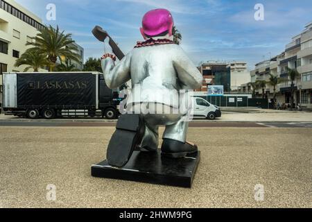 Carnaval Quarteira, An outsize Pierrot clown character on the seafront in Quarteira, Portugal. Stock Photo