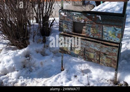 Old street mailboxes in a snowy winter in the historic center of Voronezh, Russia. Stock Photo