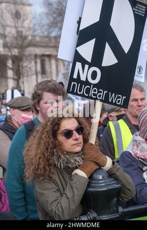 London, UK. 6th Mar 2022. Speakers at a rally by Stop the War & CND in Trafalgar Square call for an immediate ceasefire in Ukraine and the withdrawal of all Russian troops. They warn a nuclear war would be disastrous for everyone, and called for an end to 30 years of provocation by the US and NATO, in which Britain has played a leading role, talking up war, decrying democracy, deploying military support to countries neighbouring Russia and generally failing to act in any war to encourage world peace. Peter Marshall/Alamy Live News Stock Photo