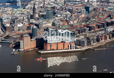 Hamburg, Germany. 05th Mar, 2022. The aerial view shows the Elbphilharmonie in the port of Hamburg. Credit: Daniel Reinhardt/dpa/Alamy Live News Stock Photo