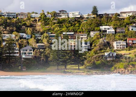 Waterfront homes at Whale Beach in Sydney, a suburb in the northern beaches region of Sydney,NSW,Australia Stock Photo