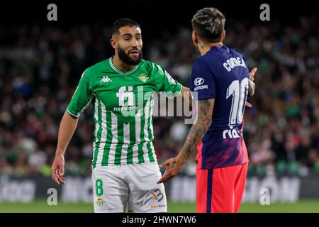 Seville, Seville, Spain. 6th Mar, 2022. Nabil Fekir of Real Betis in action with Angel Correa of Atletico de Madrid during the La Liga Santader match between Real Betis and Atletico de Madrid at Benito Villamarin in Seville, Spain, on March 06, 2022. (Credit Image: © Jose Luis Contreras/DAX via ZUMA Press Wire) Stock Photo