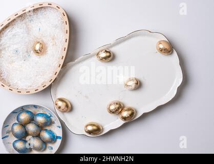 Happy easter time. Bright Easter holiday concept with spring flowers and easter eggs. Colorful Easter eggs background Stock Photo