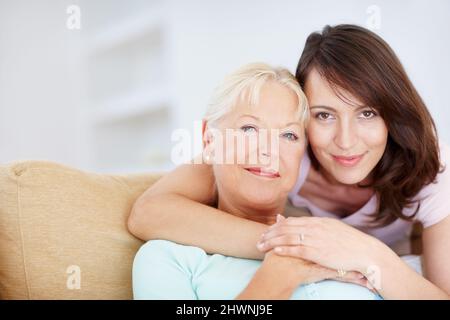 Im so grateful for everything shes done for me. A loving daughter embracing her mother - Copyspace. Stock Photo