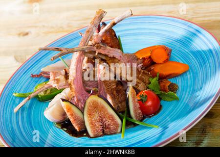 Plate of roasted mutton ribs Stock Photo