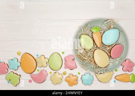 Easter still life with cookies on white background with space. Stock Photo