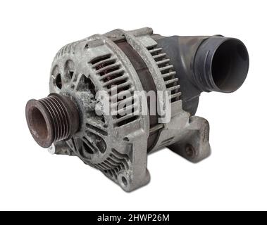 Car generator, car electrical network element on white background, generator details close-up. Spare auto parts for repair. Stock Photo