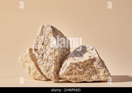 Natural granit stone on beige background, minimal product podium Stock Photo