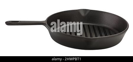 Empty cast iron grill frying pan isolated on white background with clipping path Stock Photo
