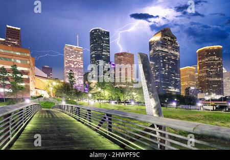 Houston Texas modern skyline at sunset twilight from park