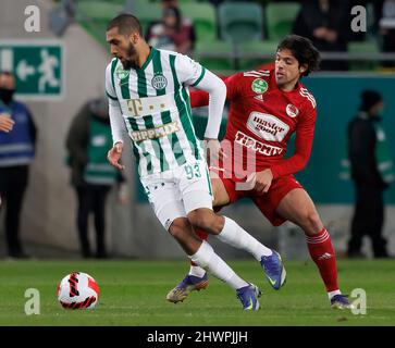 BUDAPEST, HUNGARY - MARCH 6: Lazar Zlicic of Kisvarda Master Good  challenges Aissa Laidouni of Ferencvarosi TC during the Hungarian OTP Bank  Liga match between Ferencvarosi TC and Kisvarda Master Good at