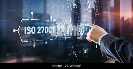 ISO 27001. International information security standard. Concept of ISO standards quality control warranty. Stock Photo