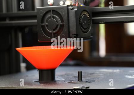 3D printer in the process of printing a fully functional loudspeaker for replacement of broken speakers on some electronic audio device Stock Photo