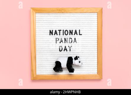 National Panda Day 16 March celebrate fluffiest, bamboo-munching bears that are source of national pride for China. That's why it is important to prot Stock Photo