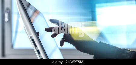 Hand of engineer using tablet PC at home office Stock Photo