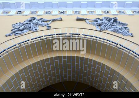 Bas-relief over arch 'Glories trumpeting victory' in St. Petersburg, Russia Stock Photo