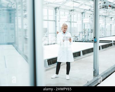 Scientist using tablet PC in industry Stock Photo