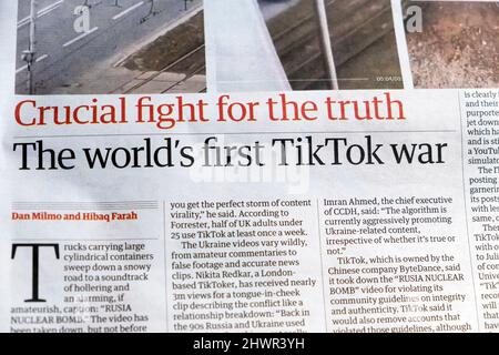 'Crucial fight for the truth The world's first TikTok war' Russia Ukraine war article in Guardian newspaper headline 5 March 2022 London England UK Stock Photo