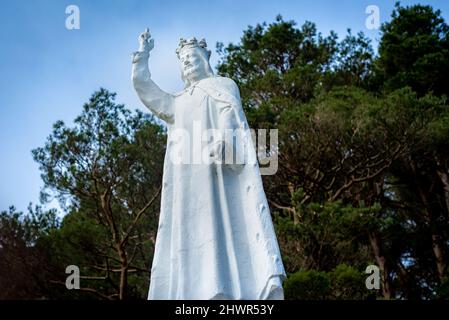 Side view of iconic Christ the King statue with raised hand at Glen of Aherlow, County Tipperary, Ireland.  Stock Photo