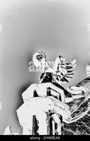 Old Gothic medieval gargoyle wearing a covid 19 pandemic face mask. Stock Photo