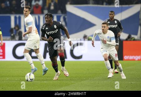 Axel Disasi of Monaco, Valentin Rongier of Marseille during the French championship Ligue 1 football match between Olympique de Marseille (OM) and AS Monaco (ASM) on March 6, 2022 at Velodrome stadium in Marseille, France - Photo: Jean Catuffe/DPPI/LiveMedia Stock Photo