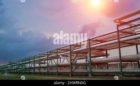 Background of petrochemical pipeline on pipe rack at industrial zone. Stock Photo