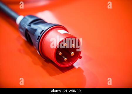 High voltage industrial electrical socket, 380 volt three phase plug to an outlet. Stock Photo
