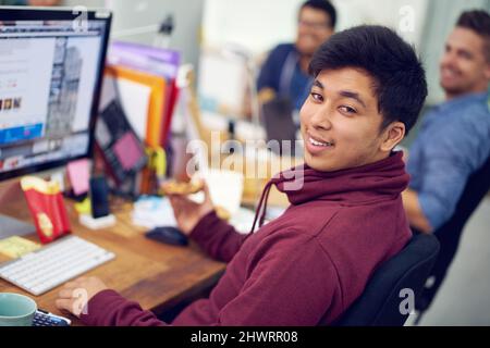 The IT experts. Shot of employees in an IT office. Stock Photo
