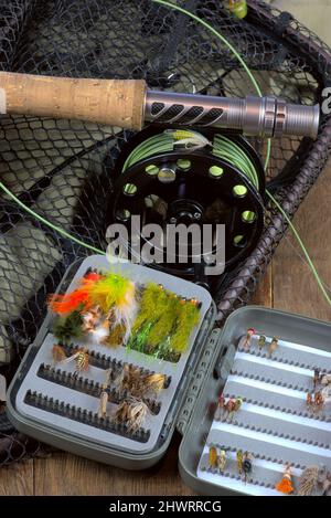 Tackle Box with Flies and Fly Fishing Rod Stock Photo - Image of