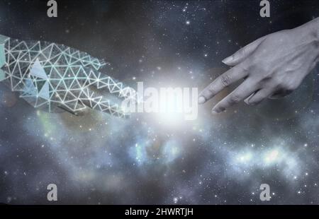 Robot and human reaching towards each other Stock Photo