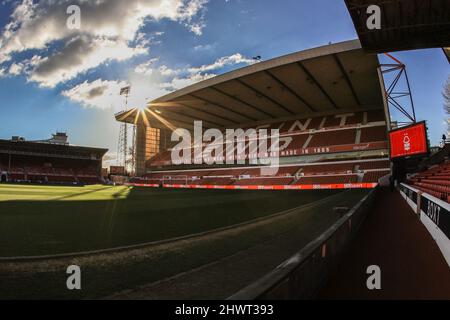 The sun bursts over the Trent End stand,#tweet at the City Ground ahead of this evenings Emirates FA Cup 5th Round fixture, Nottingham Forest vs Huddersfield Town Stock Photo