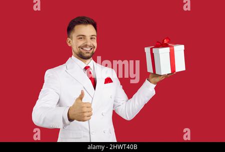 Young man in a red women's bra. Gay Stock Photo