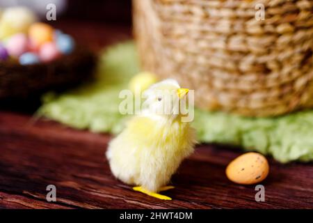 Easter background with yellow chicks and eggs. Easter holidays Stock Photo